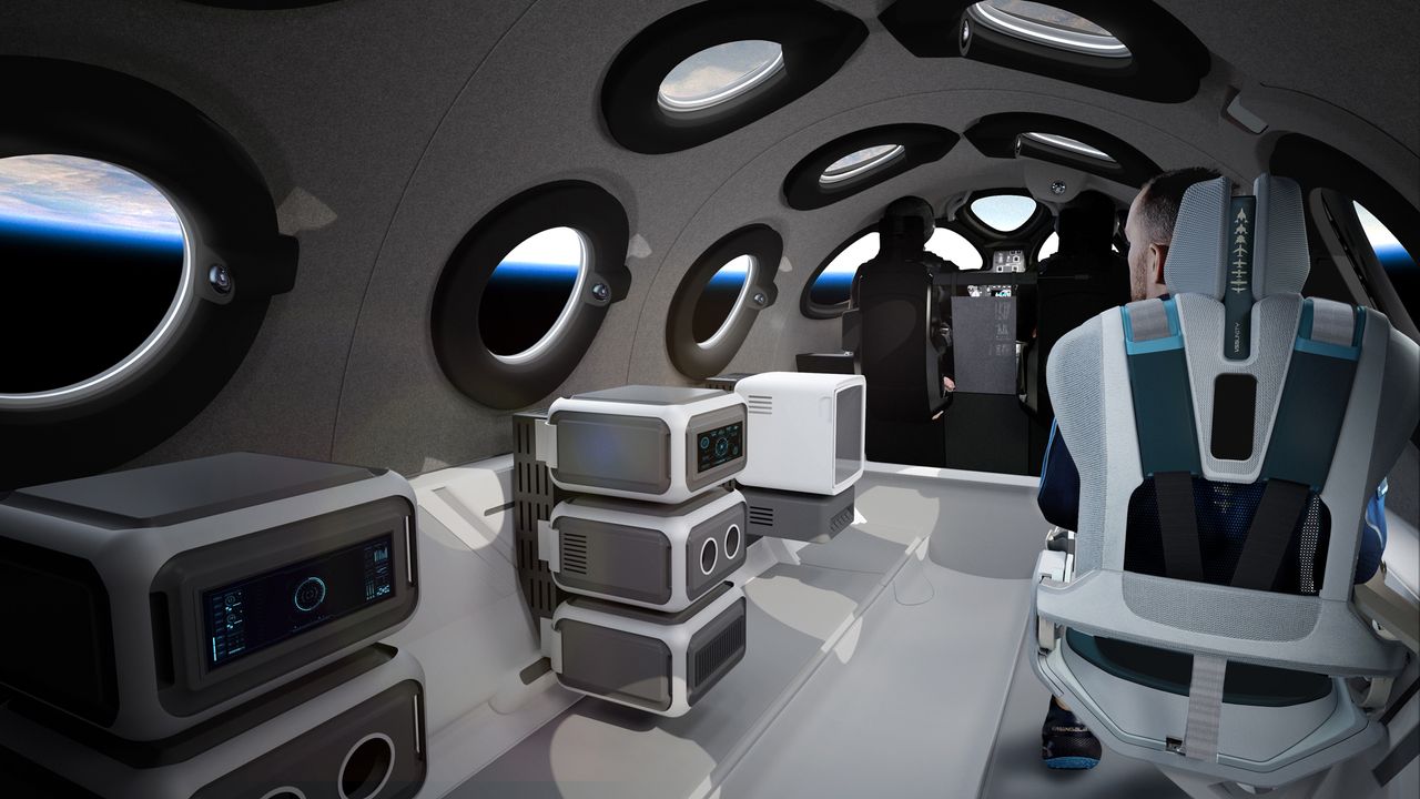 This view of the SpaceShpTwo cabin shows a configuration for science payloads, which take the place of some seats.