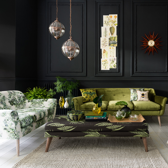 living room with sofa and panelled wall