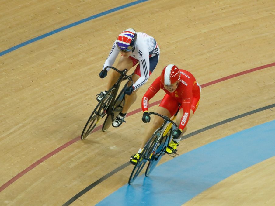 Katy Marchant of Great Britain (L) competes with Guo Shuang of China