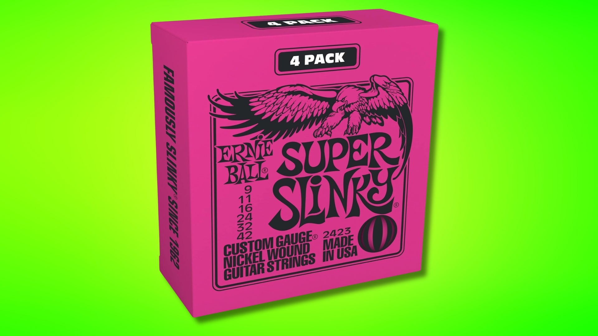 Pink 4-pack of Ernie Ball Slinky guitar strings on a green background