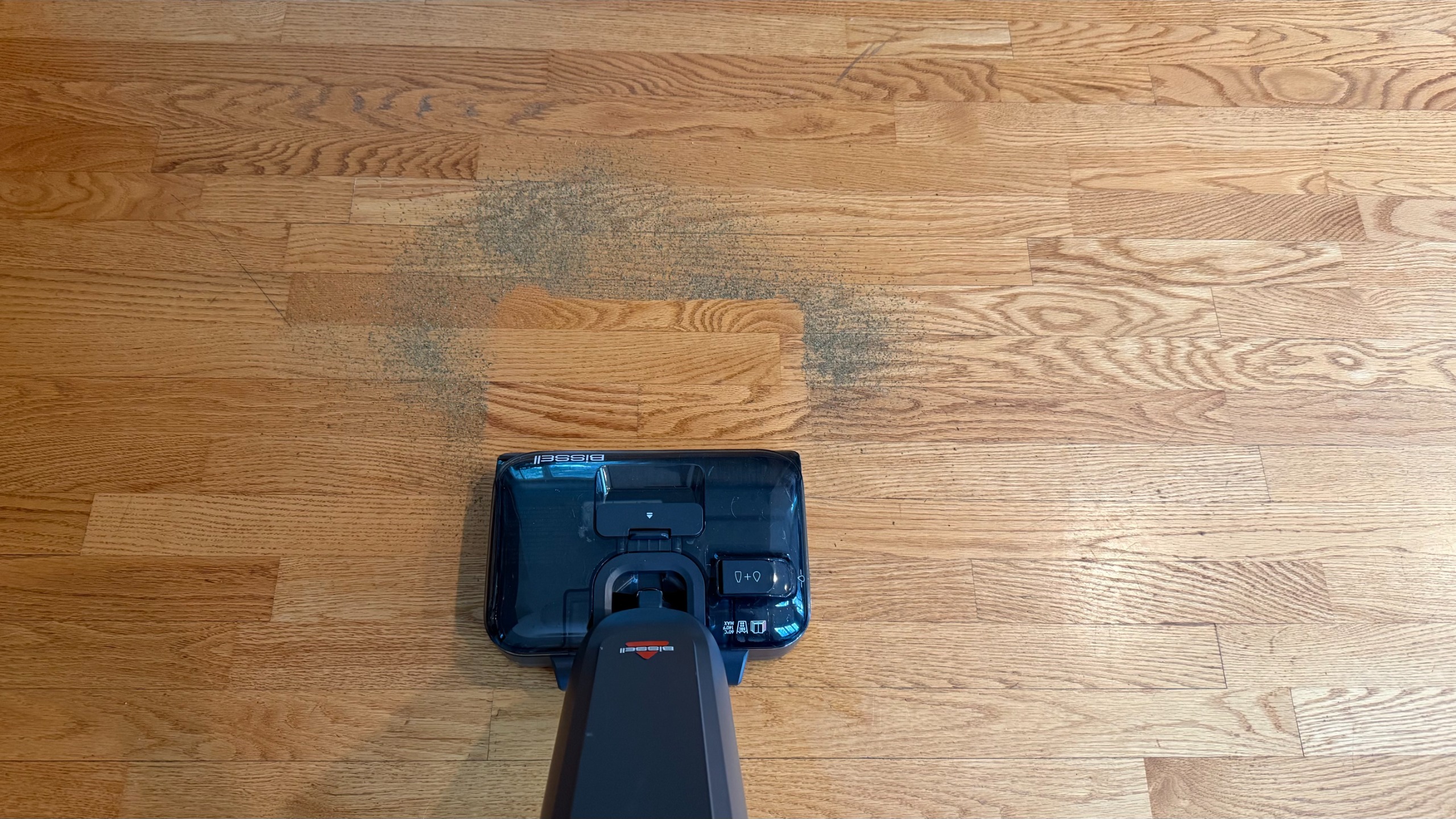 The Bissell CrossWave Reach Plus in process of cleaning up tea leaves