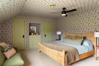 bedroom with matching wallpaper on ceiling and walls and lime green accent colors