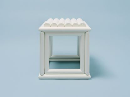 White square stool featuring lacquered wood and scalloped leather seat by Jonathan Saunders