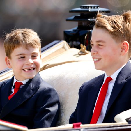 Prince George and Prince Louis climbing rocks
