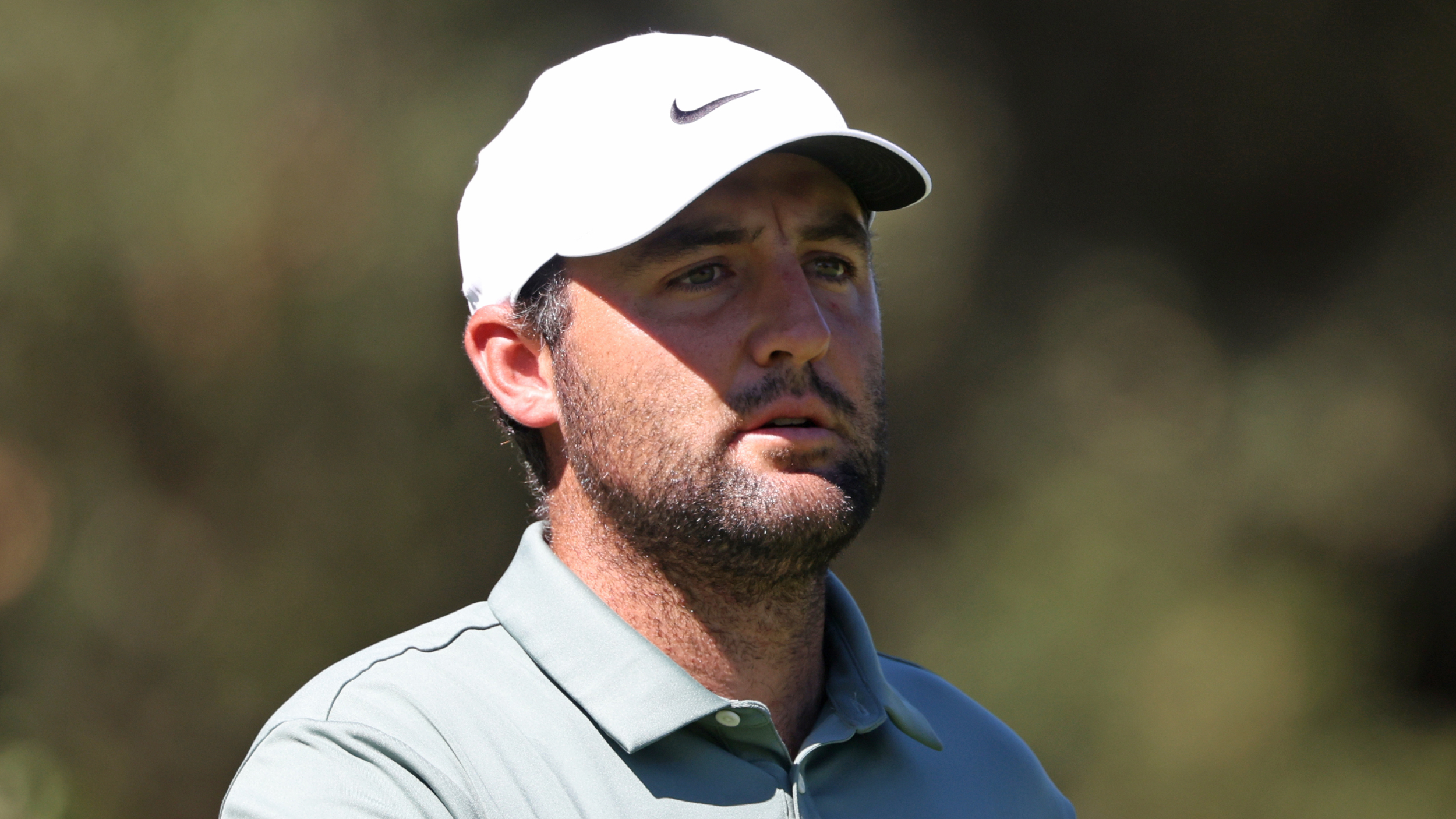 Scottie Scheffler watches a shot