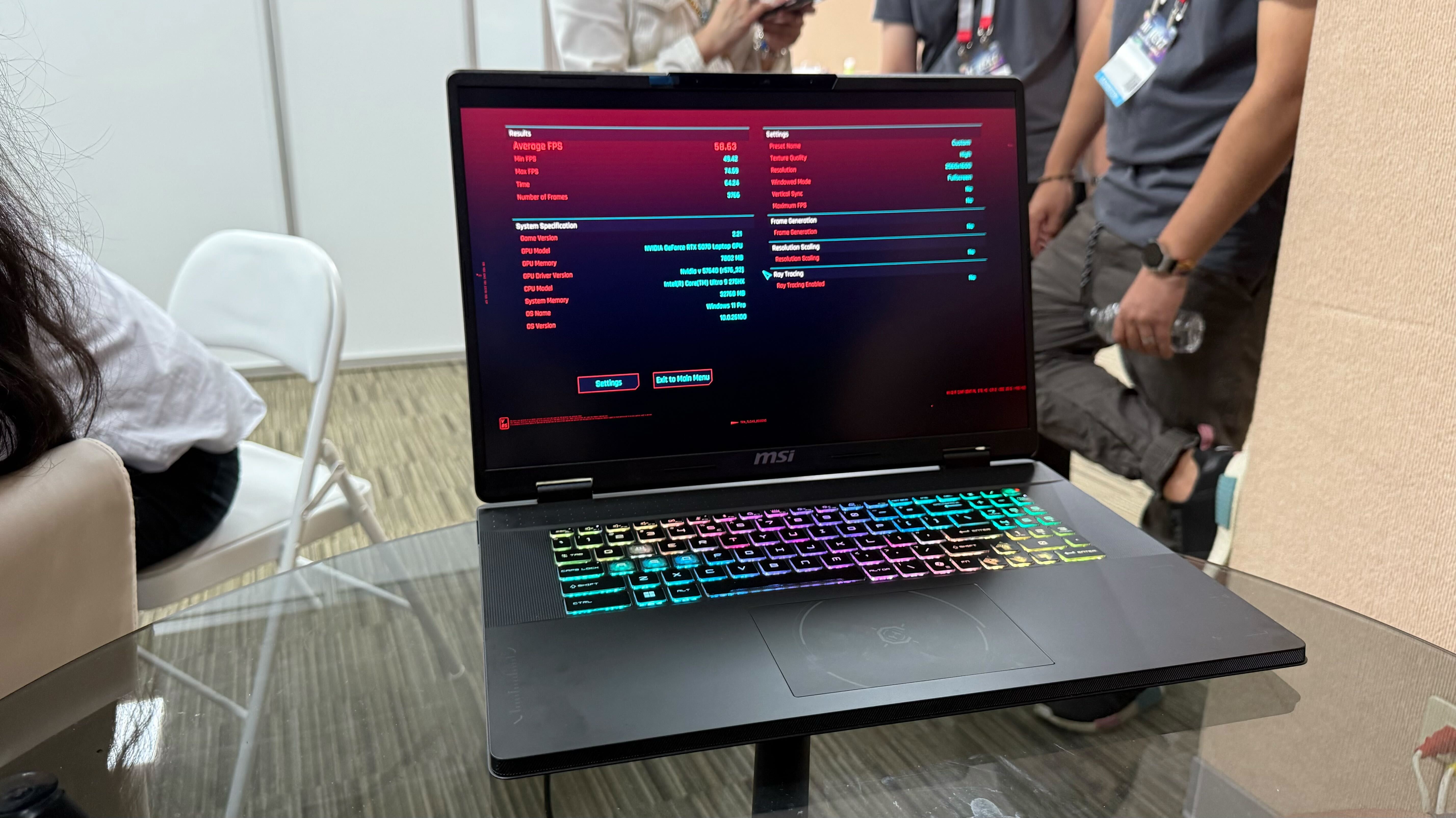 MSI Crosshair 18 HX gaming laptop with an RTX 5070, being benchmarked at Computex in Taipei.