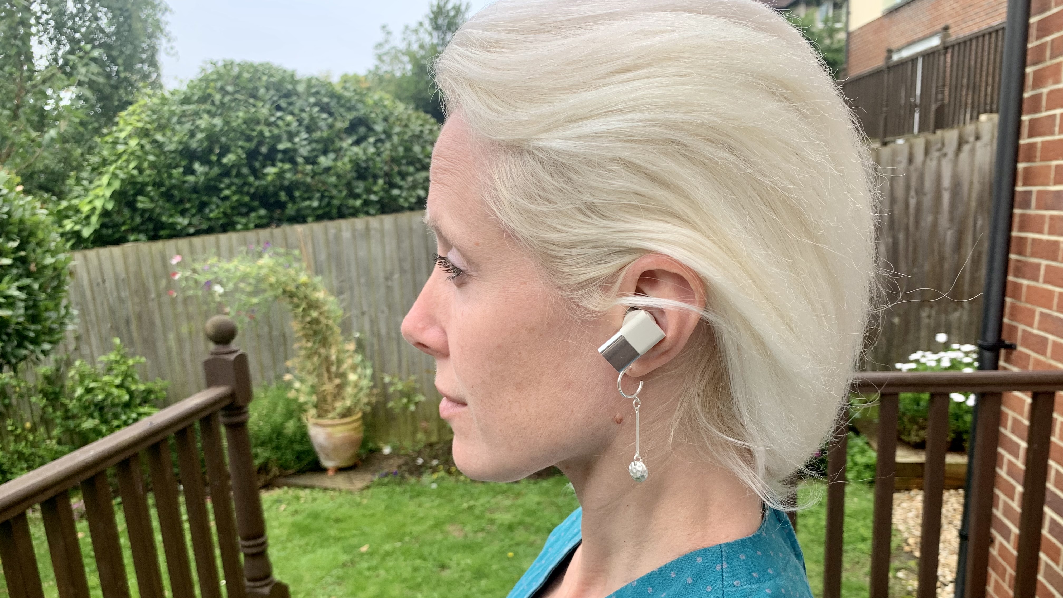 Status Between 3ANC earbuds worn by TechRadar's Becky Scarrott, outside