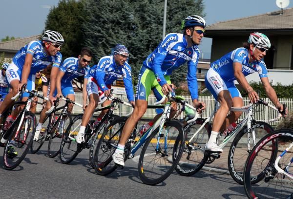 Alessandro Ballan, Giovanni Visconti, Stefano Garzelli, Ivan Basso and Filippo Pozzato round a corner