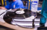 A stack of records at an EvoVinyl pressing plant.