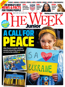 The Week Junior magazine cover featuring image of a pre-teen girl holding a homemade "Save Ukraine" sign.