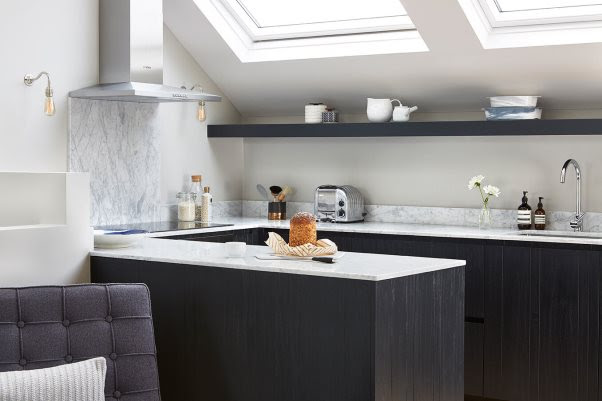small open plan kitchen with roof lights