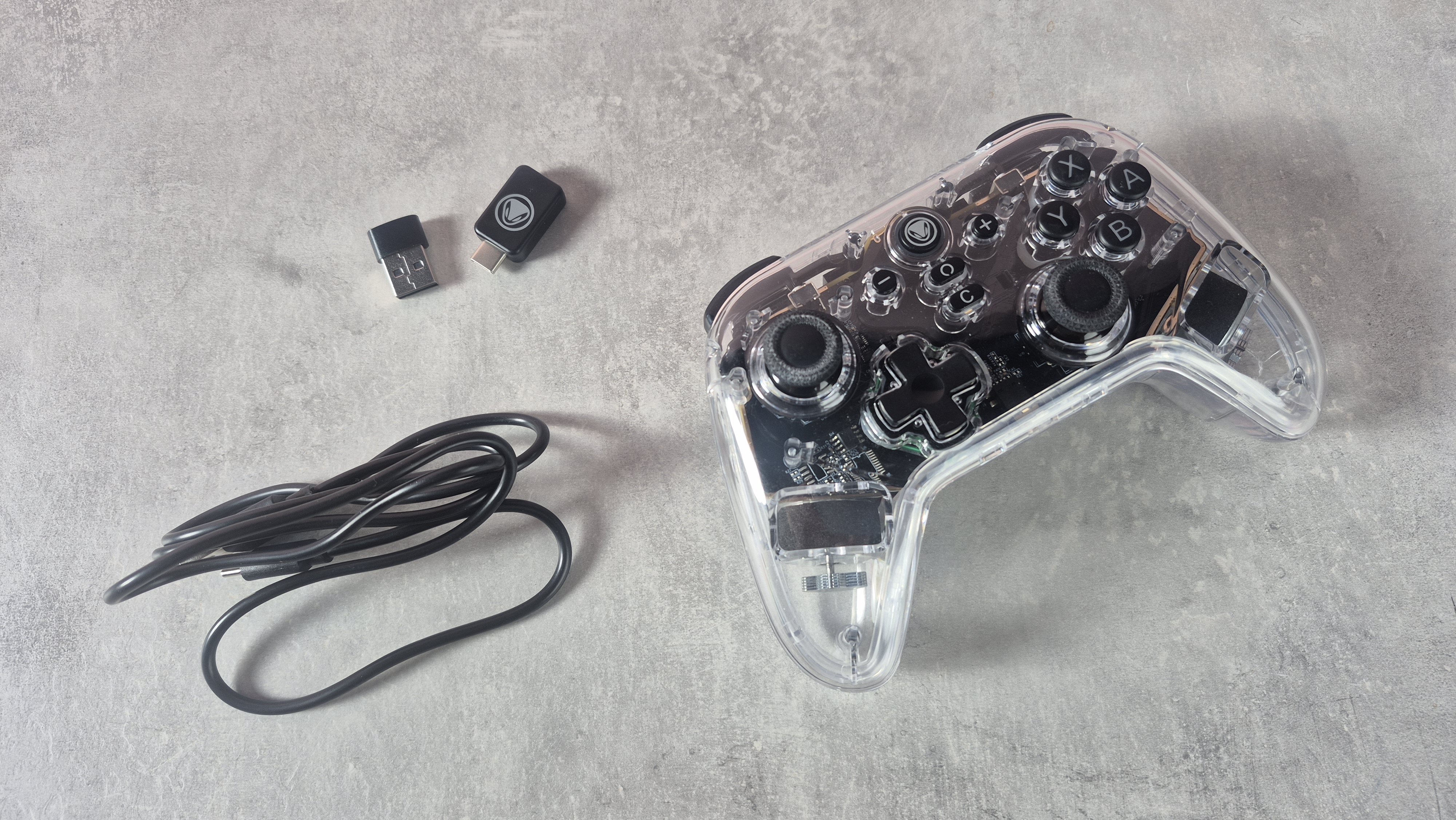 Snakebyte Gamepad RGB S2 with USB-C cable, dongle, and USB-A dongle adapter