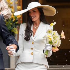Dua Lipa wears bridal hat to her 2026 wedding to Callum Turner in London.