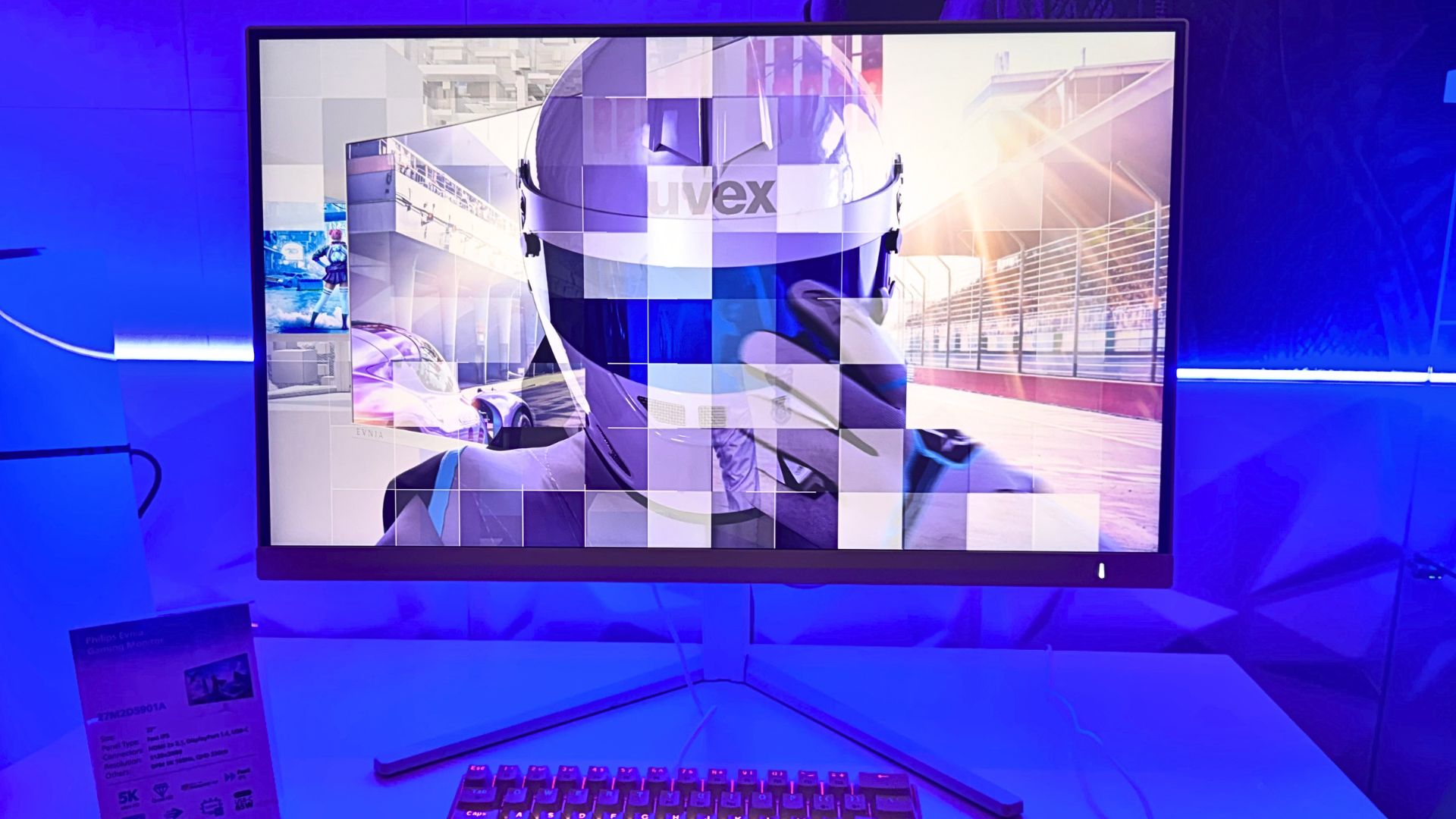 AOC's 27M2D901A gaming monitor on a blue background