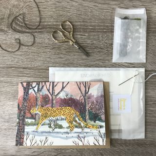 Christmas card with stitching on it