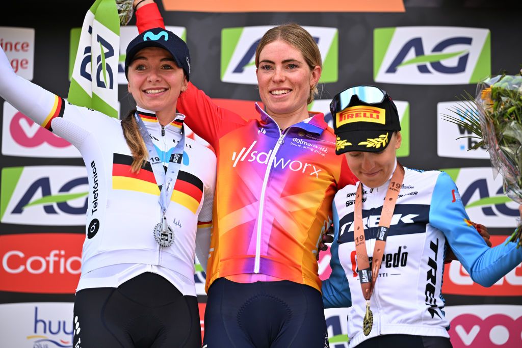 HUY BELGIUM APRIL 19 LR Liane Lippert of Germany and Movistar Team on second place race winner Demi Vollering of The Netherlands and Team SD Worx and Gaia Realini of Italy and Team Trek Segafredo on third place pose on the podium ceremony after the 26th La Fleche Wallonne Feminine 2023 a 1273km one day race from Huy to Mur de Huy UCIWWT on April 19 2023 in Huy Belgium Photo by David StockmanGetty Images