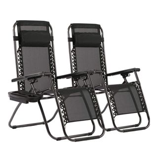 Two black lounge chairs with reclining features