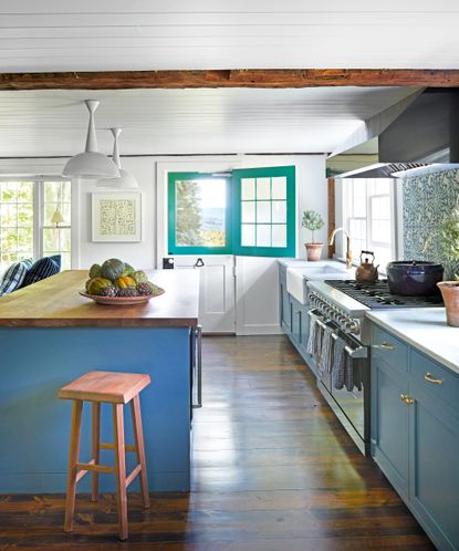 The farmhouse is a masterclass in adding touches of vibrant color to a ...