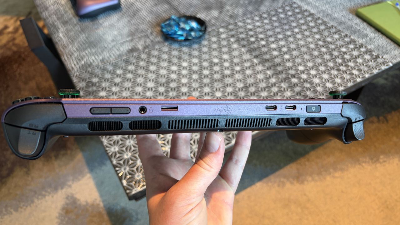 Bottom view of an MSI Claw 8 EX AI+ handheld gaming device showing various ports and vents.