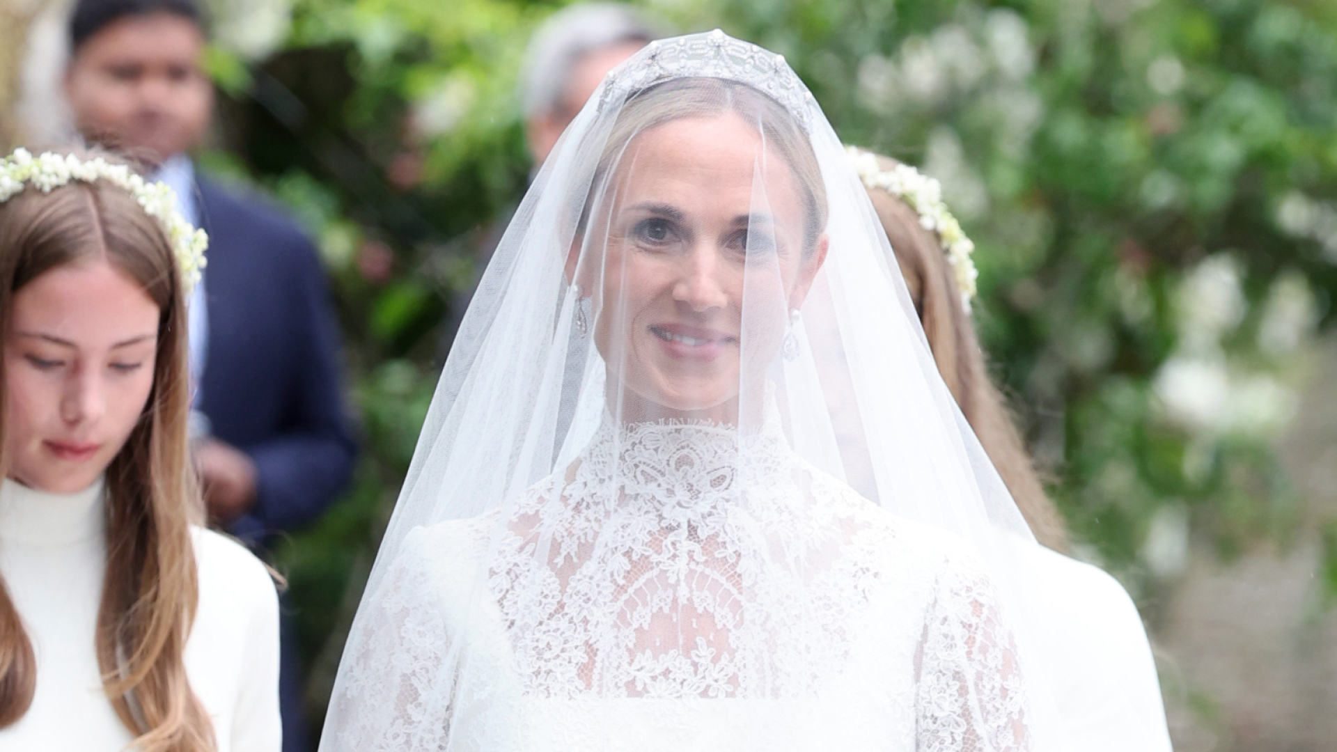 Harriet Sperling followed by her bridesmaids Georgina Sperling, Savannah Phillips and Isla Phillips for the Royal wedding of Peter Phillips and Harriet Sperling at All Saints' Church on June 06, 2026