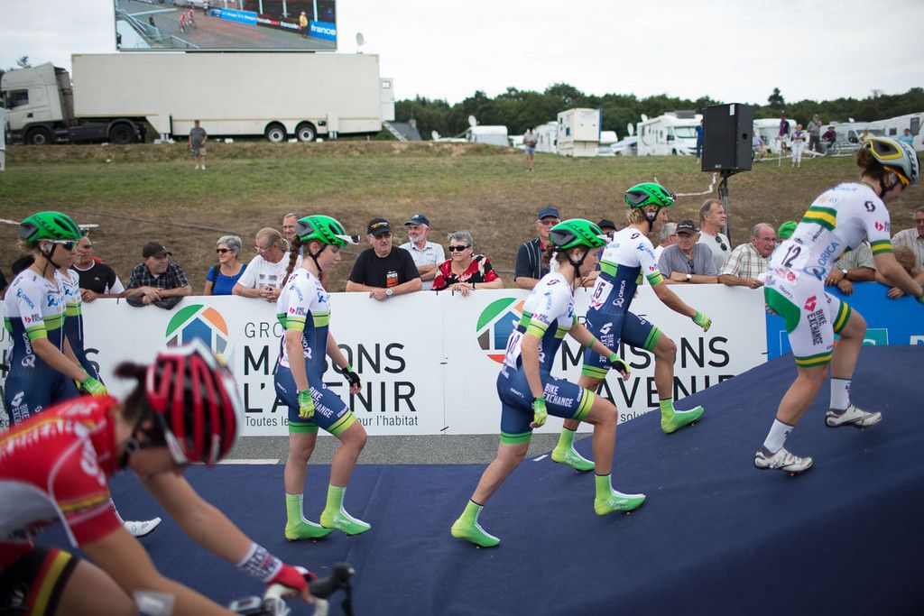 The Orica-AIS squad head to the presentation podium
