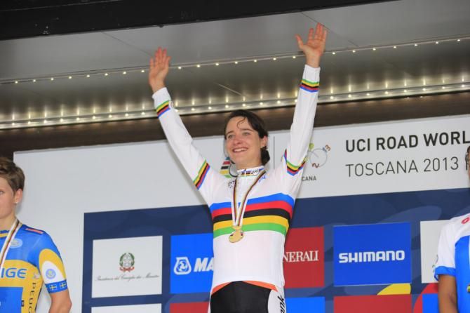 Marianne Vos (Netherlands) on the top step of the podium in Florence, Italy having won the third road race world championship of her career