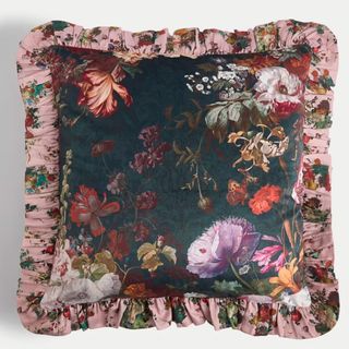 Floral cushion with ruffle trim