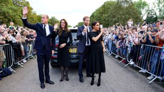 Catherine, Princess of Wales, Prince William, Prince of Wales, Prince Harry, Duke of Sussex, and Meghan, Duchess of Sussex at Windsor Castle waving to well-wishers
