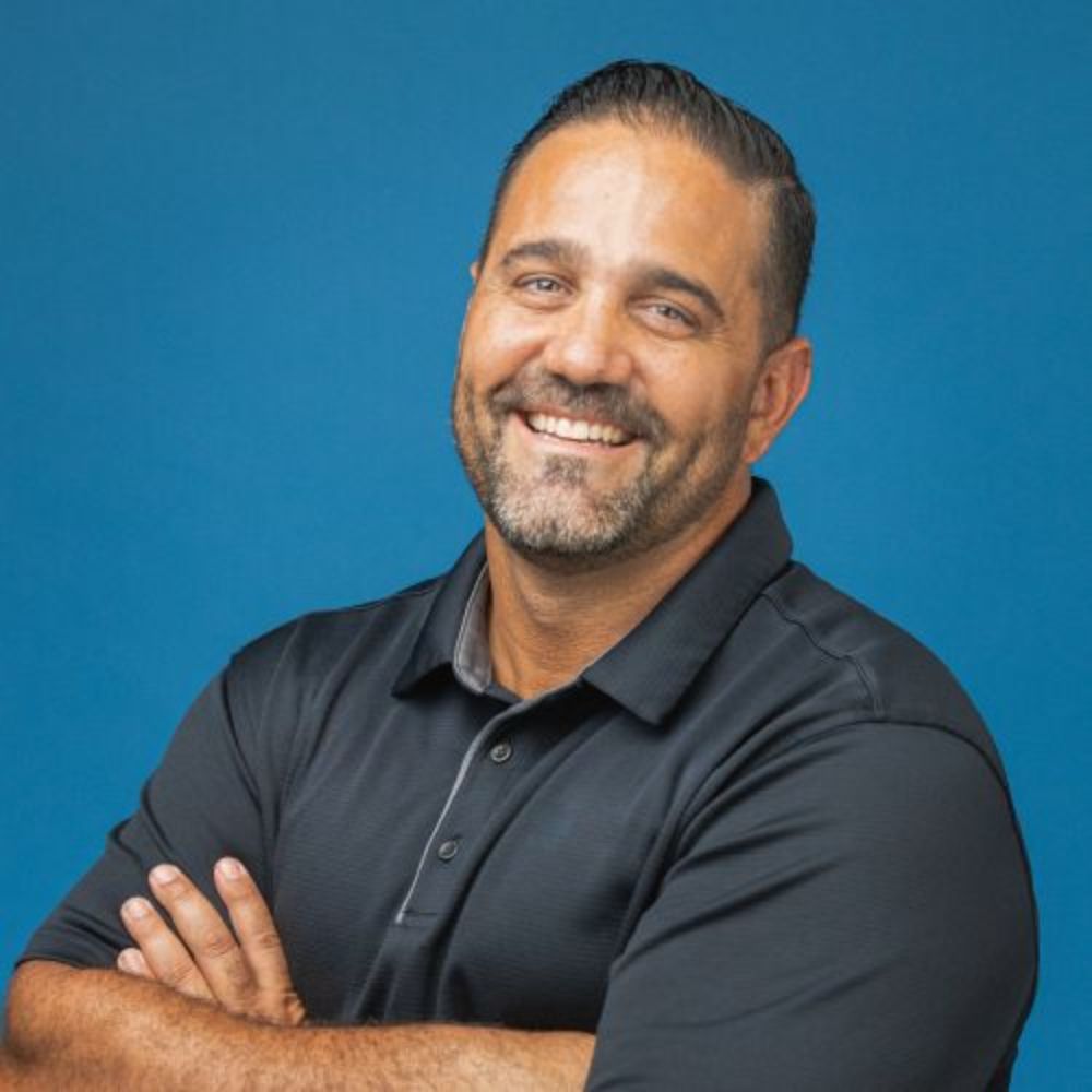 A headshot of Eric Olson