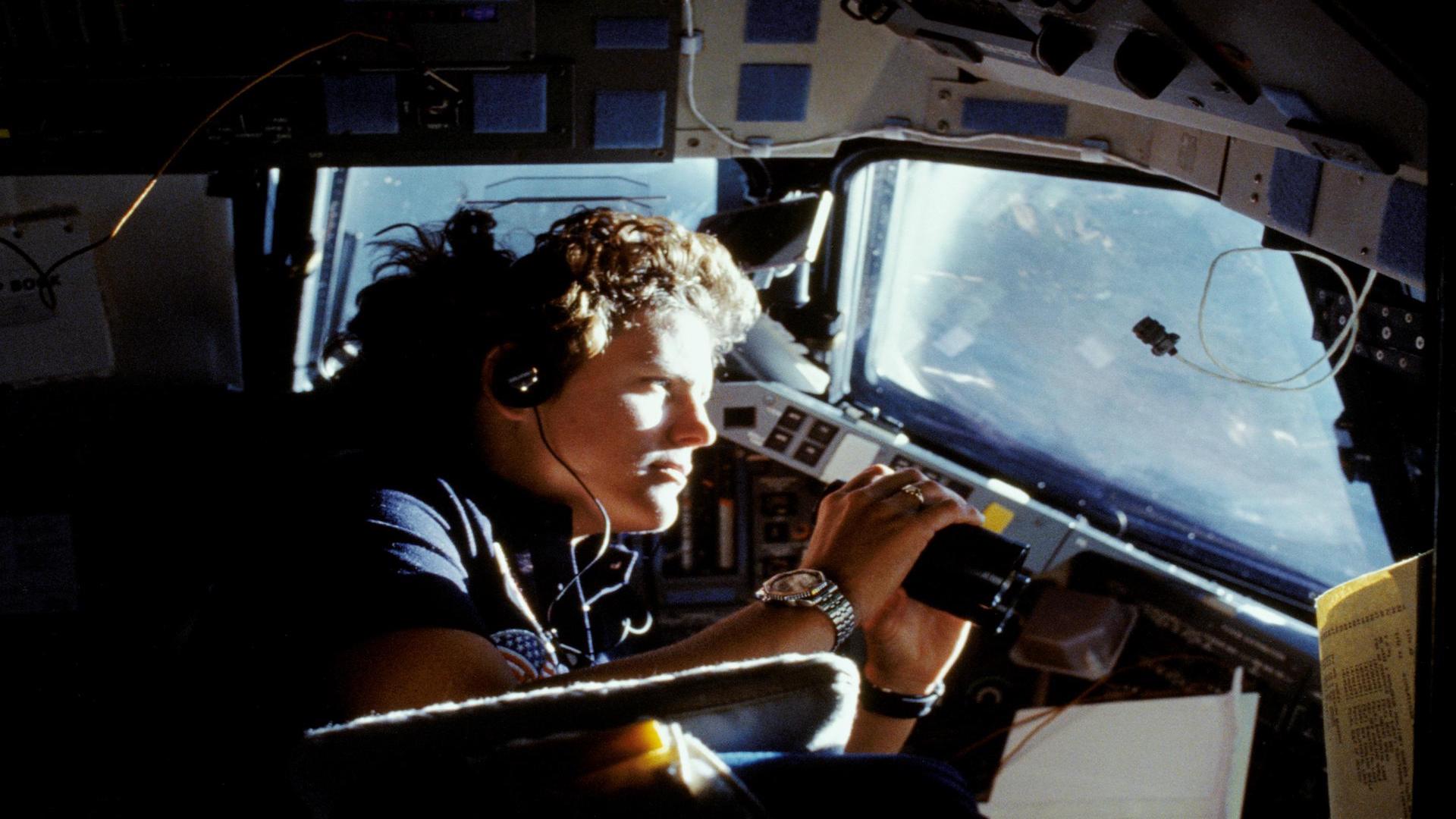 Kathryn Sullivan contemplates the Earth from the space shuttle.