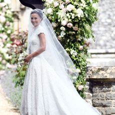 Wedding dress, Bride, Gown, Dress, Clothing, Photograph, Bridal clothing, White, Veil, Bridal accessory, 