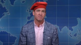 Peyton Manning on Weekend Update wearing a beret.