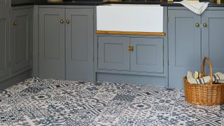 blue and white patterned tile style vinyl kitchen flooring