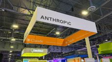 Anthropic logo pictured at the company's exhibitor stall in the vendor expo at AWS re:Invent 2025, hosted at the Venetian Hotel and Casino in Las Vegas, Nevada.
