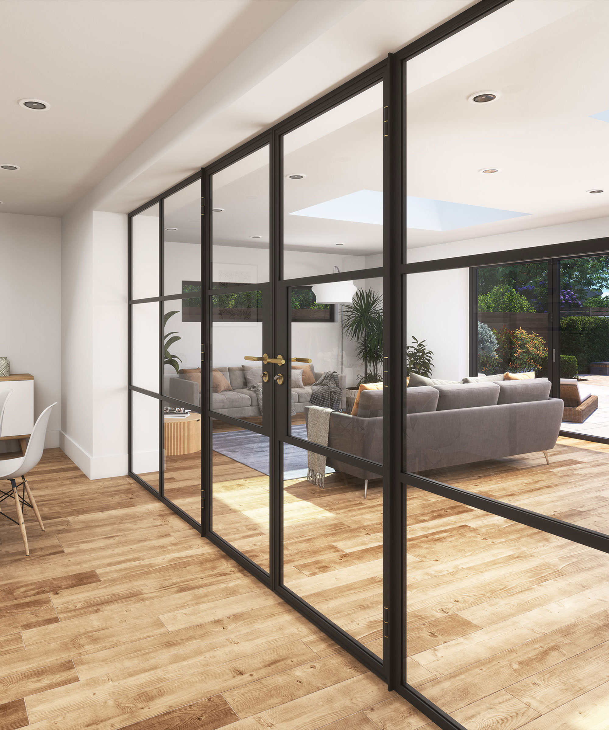 modern house with internal glass partition wall separating a dining area from a living room