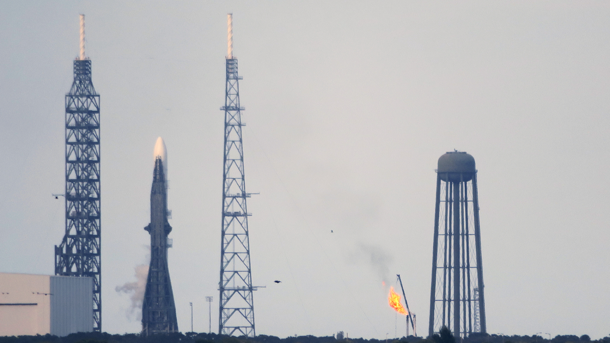  A Blue Origin New Glenn rocket stands at Pad 36 at Cape Canaveral Space Force Station after the scheduled launch was scrubbed due to weather on Nov. 9, 2025 at Cape Canaveral, Florida. Another planned launch on Nov. 12 was scrubbed due to space weather activity.