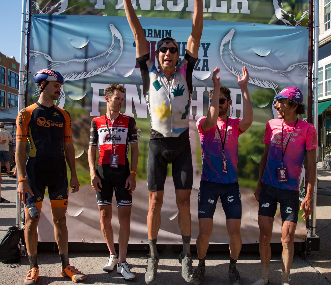 The men's podium: Payson Mcelveen, Peter Stetina, winner Colin Strickland, Alex Howes and Lachlan Morton
