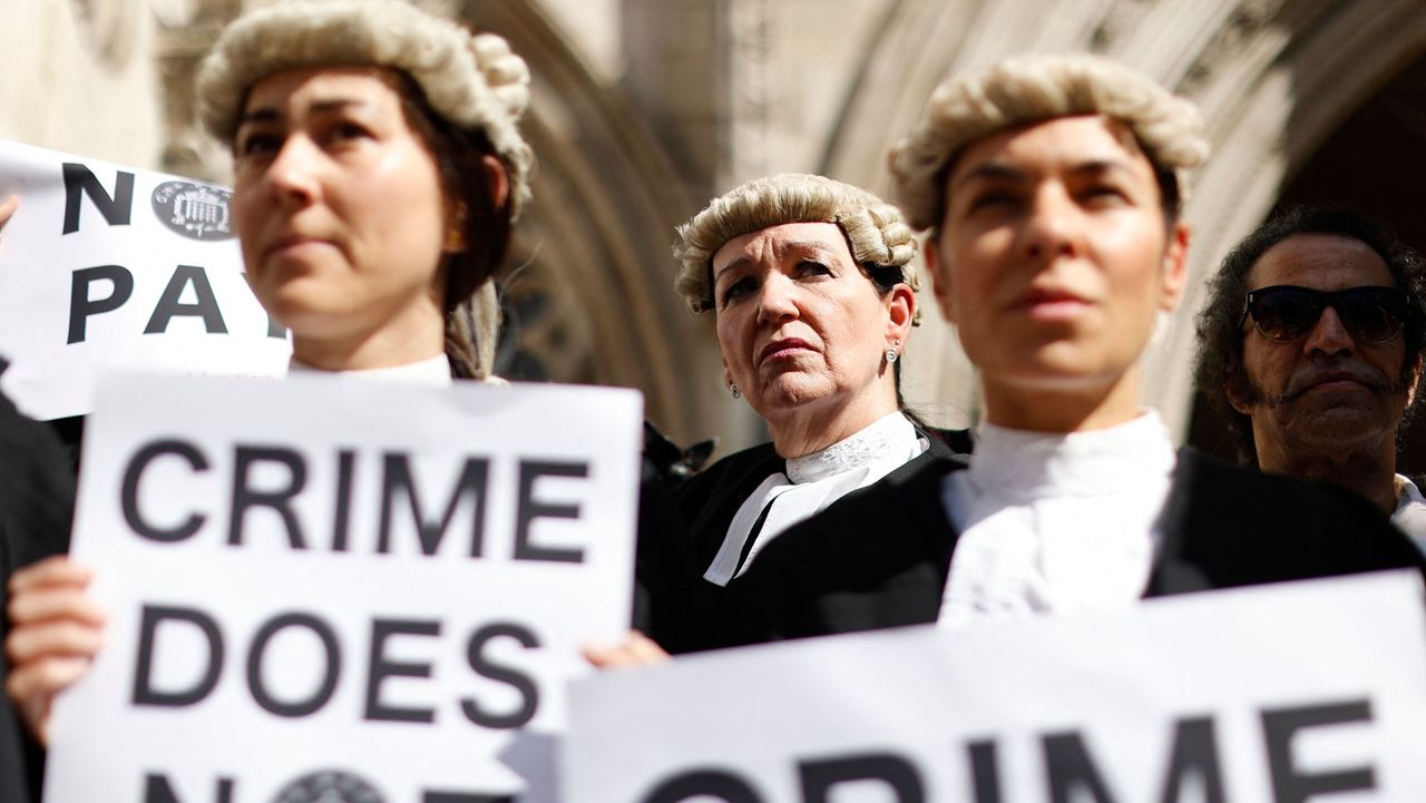 Barristers on strike outside the Royal Courts of Justice in London 