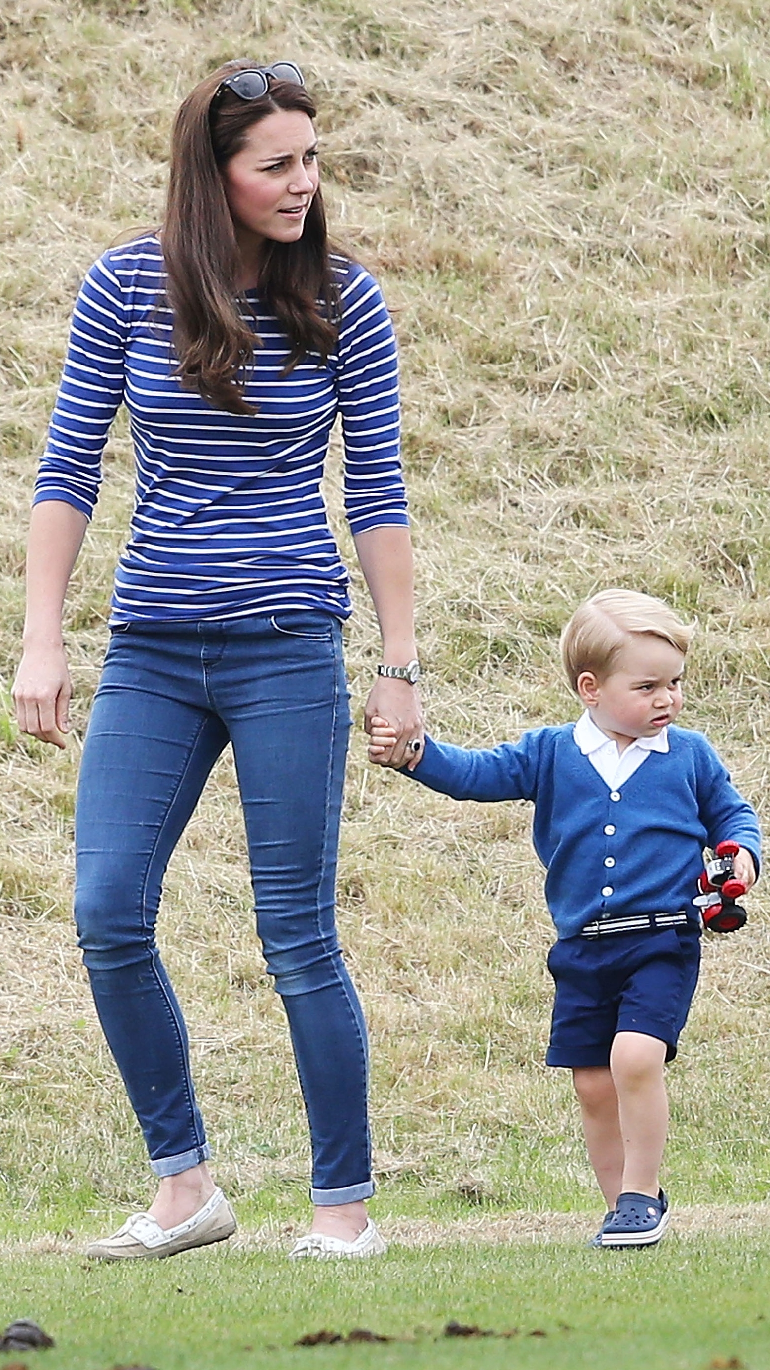 Catherine, Princess of Wales and Prince George attend the Gigaset Charity Polo Match with Prince George of Cambridge at Beaufort Polo Club on June 14, 2015