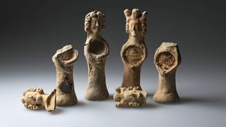 A variety of reliquaries, some with their heads missing