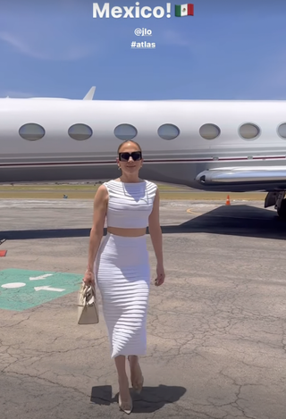 Jennifer Lopez wearing a white two-piece Alaïa set in Mexico for 'Atlas' May 2024