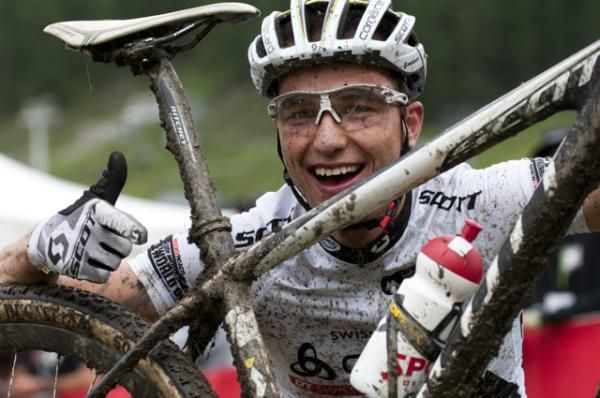 Nino Schurter (Scott-Swisspower) poses with his bike after winning