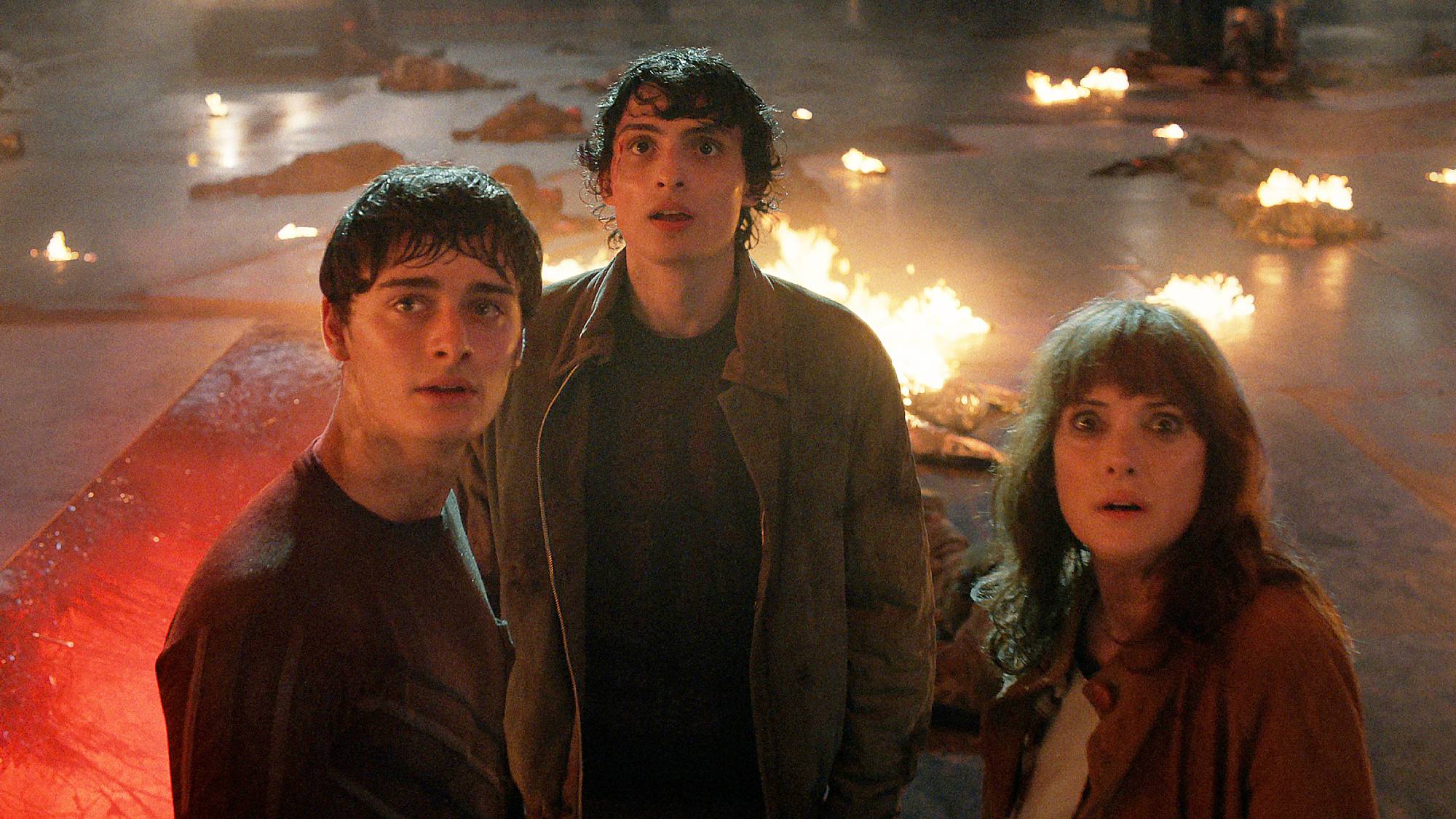 Noah Schnapp as Will Byers, Finn Wolfhard as Mike Wheeler, and Winona Ryder as Joyce Byers in "Stranger Things" season 5 part 2
