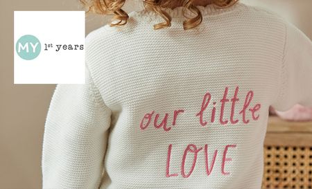 My 1st years logo top left with a close up shot of a child back with a jumper saying " our little love"