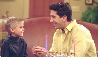 David Schwimmer as Ross and Cole/Dylan Sprouse as Ben on Friends