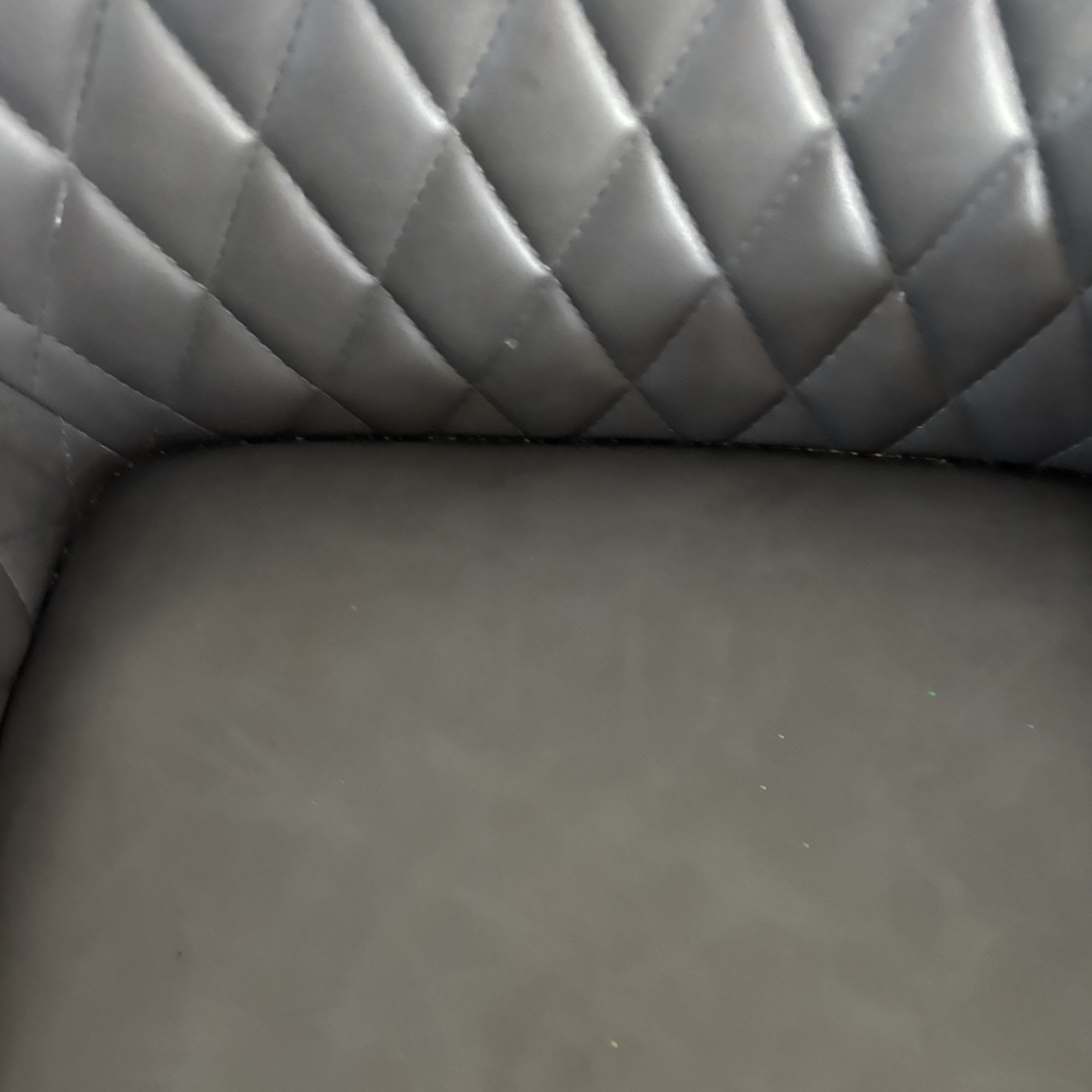 Grey breakfast stool close up