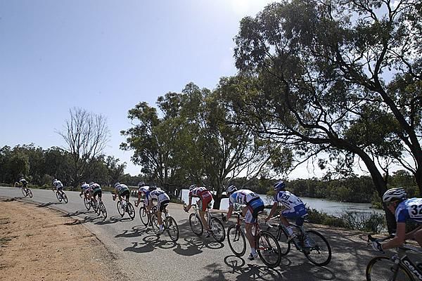 Riders swing by the Murray River in Robinvale during stage eight of the Tour.