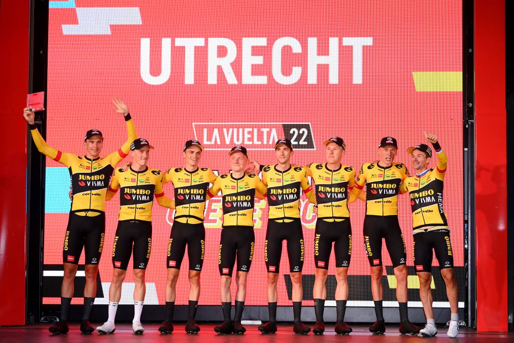 UTRECHT NETHERLANDS AUGUST 19 LR Edoardo Affini of Italy Rohan Dennis of Australia Sepp Kuss of United States Sam Oomen of Netherlands Chris Harper of Australia Mike Teunissen of Netherlands Robert Gesink of Netherlands and Primoz Roglic of Slovenia and Team Jumbo Visma celebrate winning the stage one on the podium ceremony after the 77th Tour of Spain 2022 Stage 1 a 233km team time trial in Utrecht LaVuelta22 WorldTour on August 19 2022 in Utrecht Netherlands Photo by Tim de WaeleGetty Images