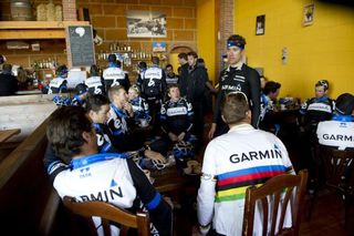 David Millar and Christian Vande Velde decide to split the bill on a coffee stop ride