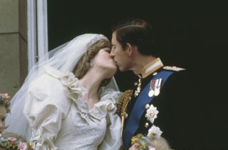 Charles and Diana kissing on their wedding day